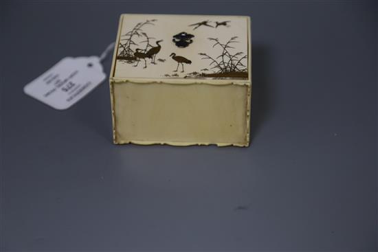 A Japanese gilt lacquered ivory model of a picnic set (Sage Jubako), Meiji period, H. 7cm, W. 8.3cm